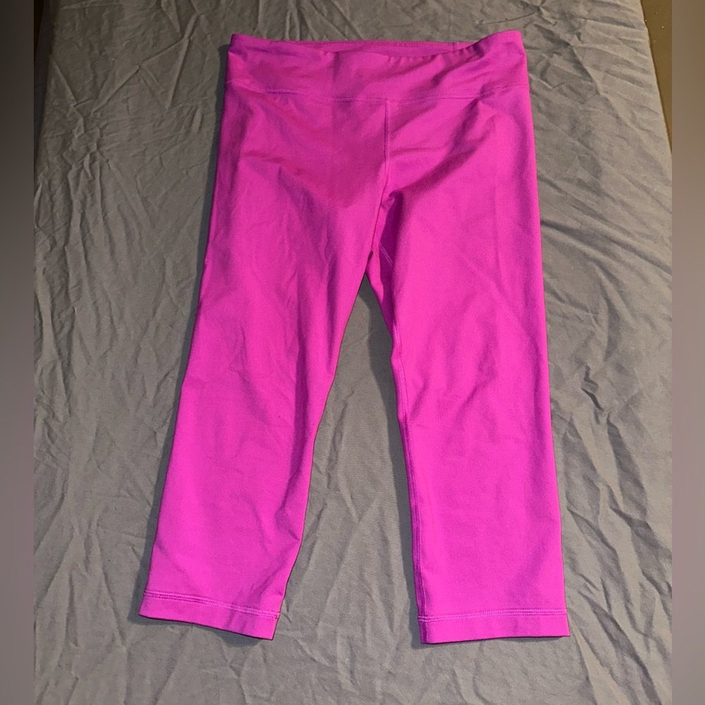 Under Armour all season gear. Pink leggings. Size Medium